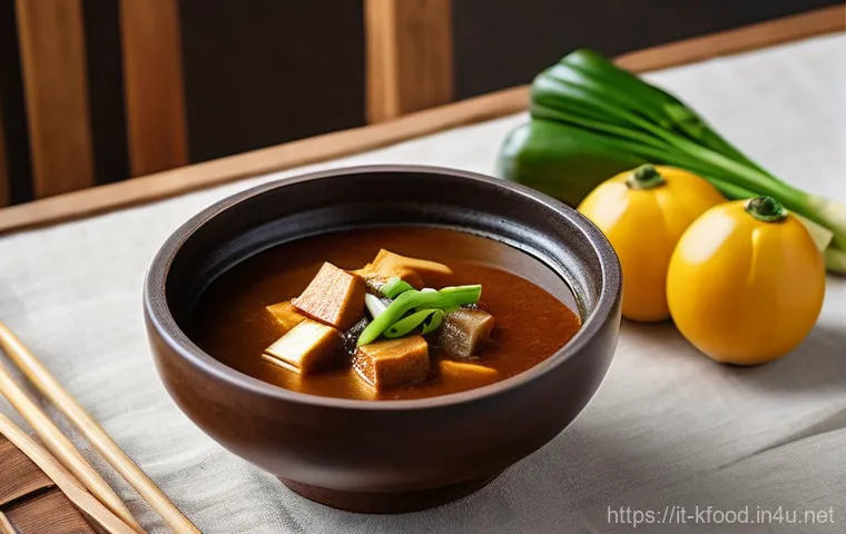 한식 소스 제품 리뷰 - **Gochujang:** A close-up, high-angle shot of a glossy, rich red Gochujang paste in a traditional wh...